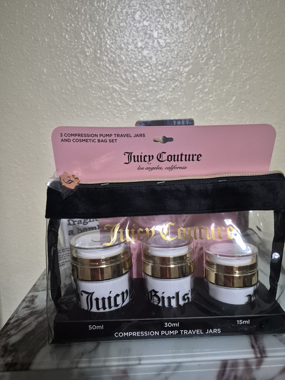 Juicy Couture Black & Gold Compression Pump Travel Jars Set
